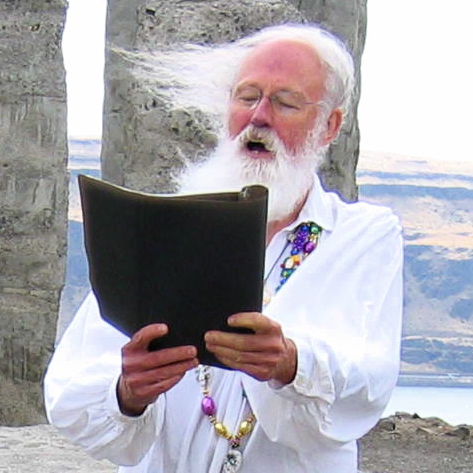 David Hedges reading at Maryhill Stonehenge. Photo copyrighted by Scottie Sterrett.